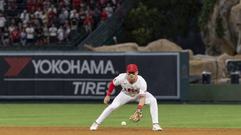 Zach Neto fielding a ground ball at shortstop for the Los Angeles Angels at Angel Stadium