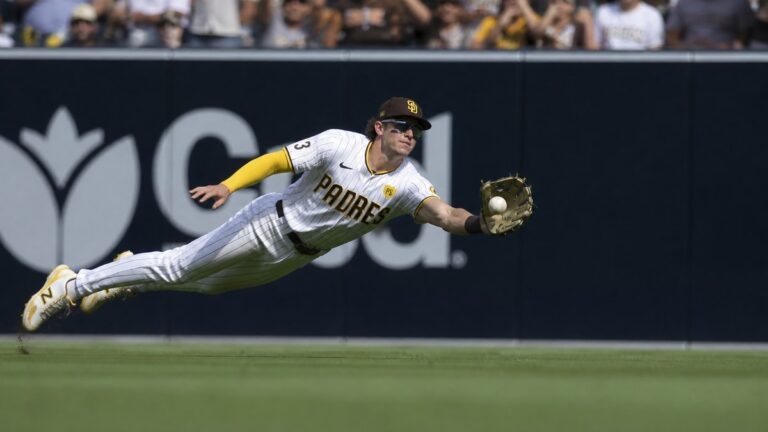Jackson Merrill making a diving catch in center field for the San Diego Padres