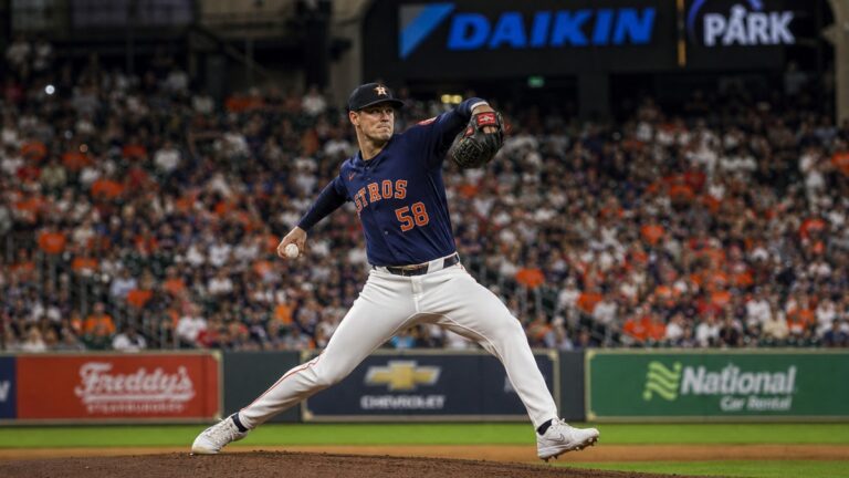Hunter Brown pitching in mid-windup delivery for the Houston Astros