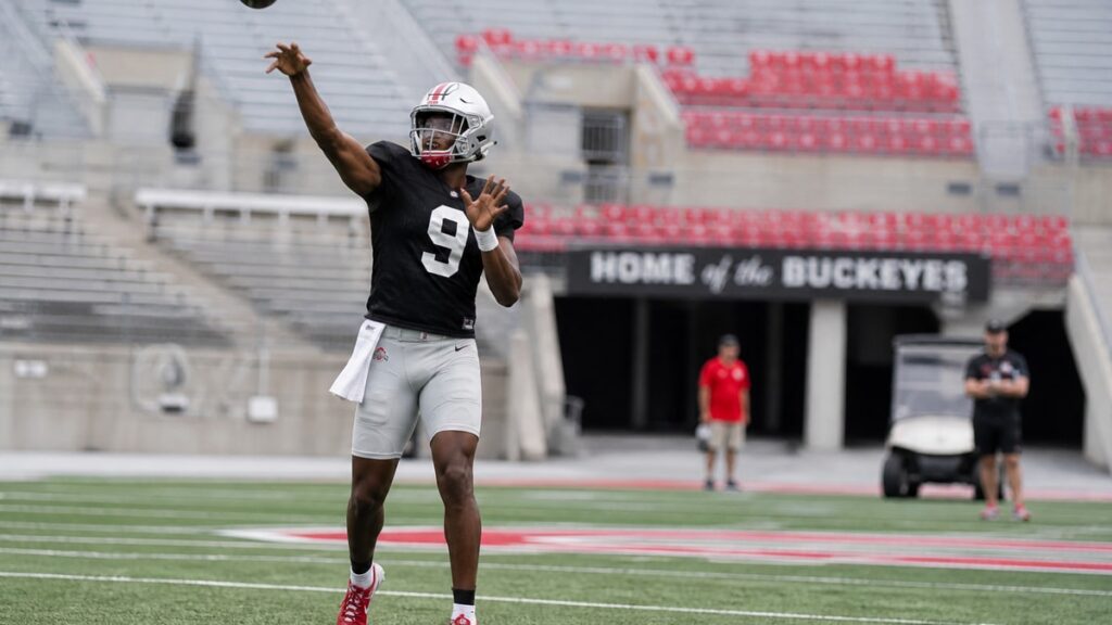 Ohio State Buckeyes quarterback throwing a pass during preseason practice