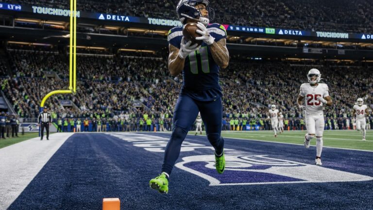 Jaxon Smith-Njigba scoring a touchdown for the Seattle Seahawks
